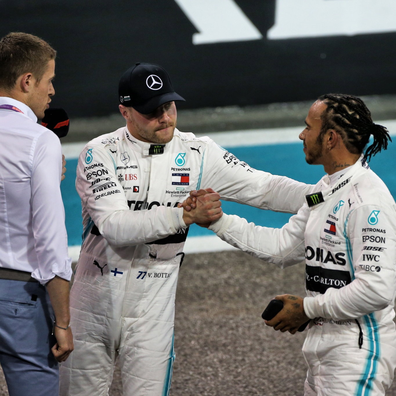 Lewis Hamilton (GBR) Mercedes AMG F1 in qualifying parc ferme with team mate Valtteri Bottas (FIN) Mercedes AMG F1 and Paul