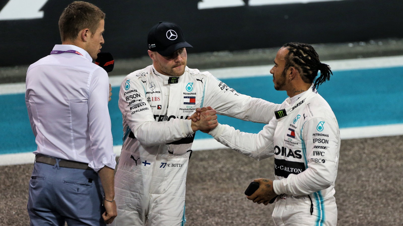 Lewis Hamilton (GBR) Mercedes AMG F1 in qualifying parc ferme with team mate Valtteri Bottas (FIN) Mercedes AMG F1 and Paul