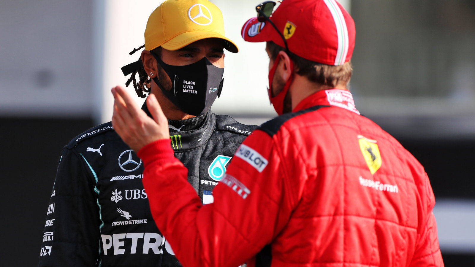 (L to R): Lewis Hamilton (GBR) Mercedes AMG F1 with Sebastian Vettel (GER)