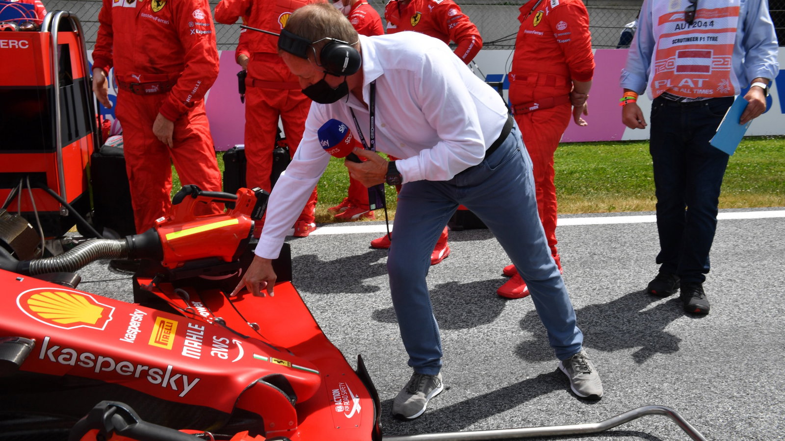 Martin Brundle (GBR) Sky Sports Commentator with an Ferrari SF-21 on the