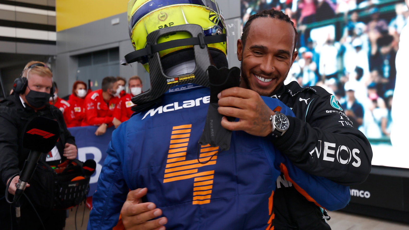 (L to R): Lando Norris (GBR) McLaren with race winner Lewis Hamilton (GBR) Mercedes AMG F1 in parc