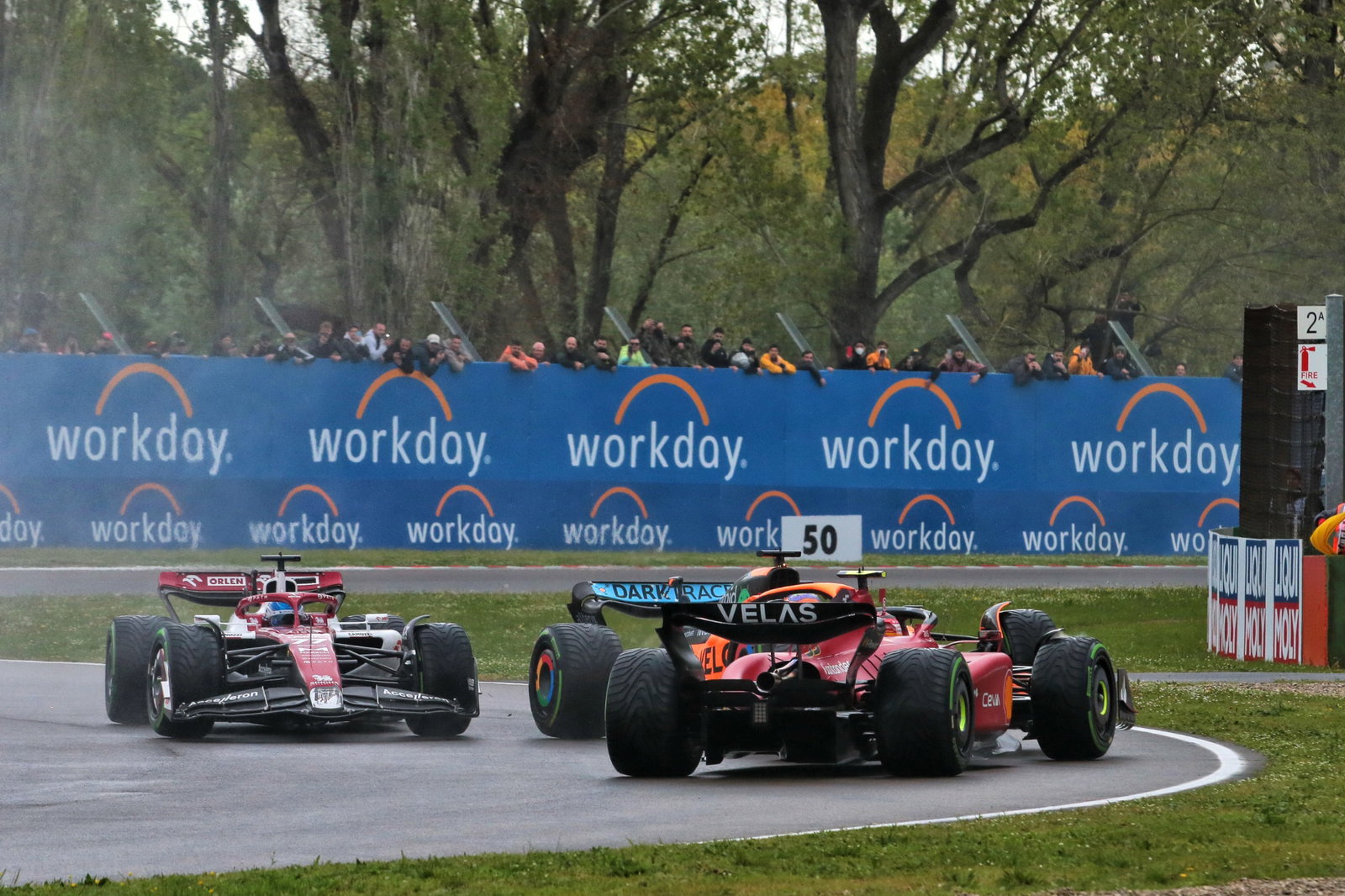 Carlos Sainz Jr (ESP) Ferrari F1-75 and Daniel Ricciardo (AUS) McLaren MCL36 collide at the start of the race. Formula 1