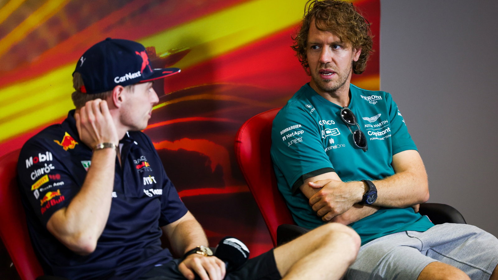 Sebastian Vettel (GER) Aston Martin F1 Team (Right) and Max Verstappen (NLD) Red Bull Racing in the FIA Press Conference.