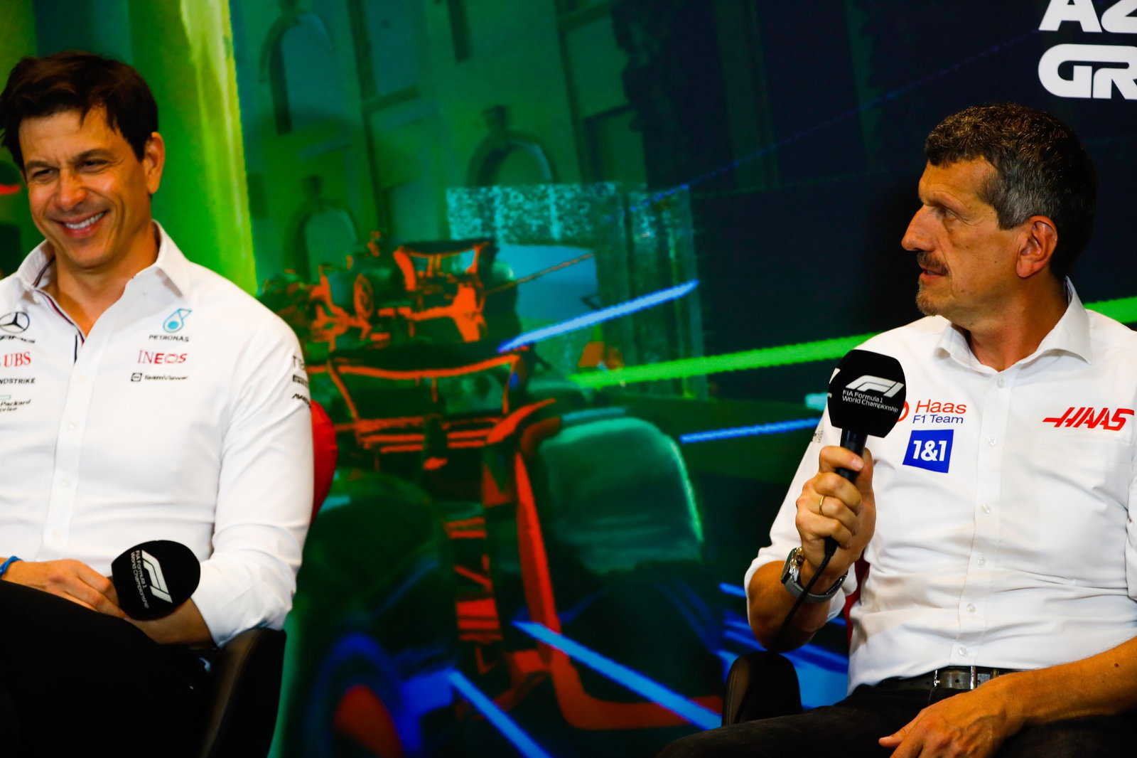 (L to R): Toto Wolff (GER) Mercedes AMG F1 Shareholder and Executive Director and Guenther Steiner (ITA) Haas F1 Team