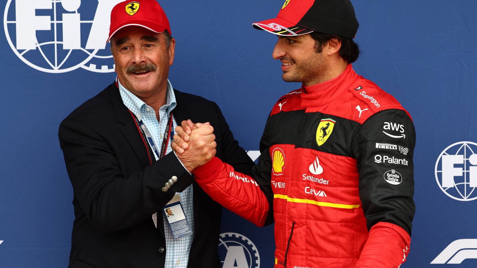 Nigel Mansell (GBR) with Carlos Sainz Jr (ESP) Ferrari F1-75. Formula 1 World Championship, Rd 10, British Grand Prix,