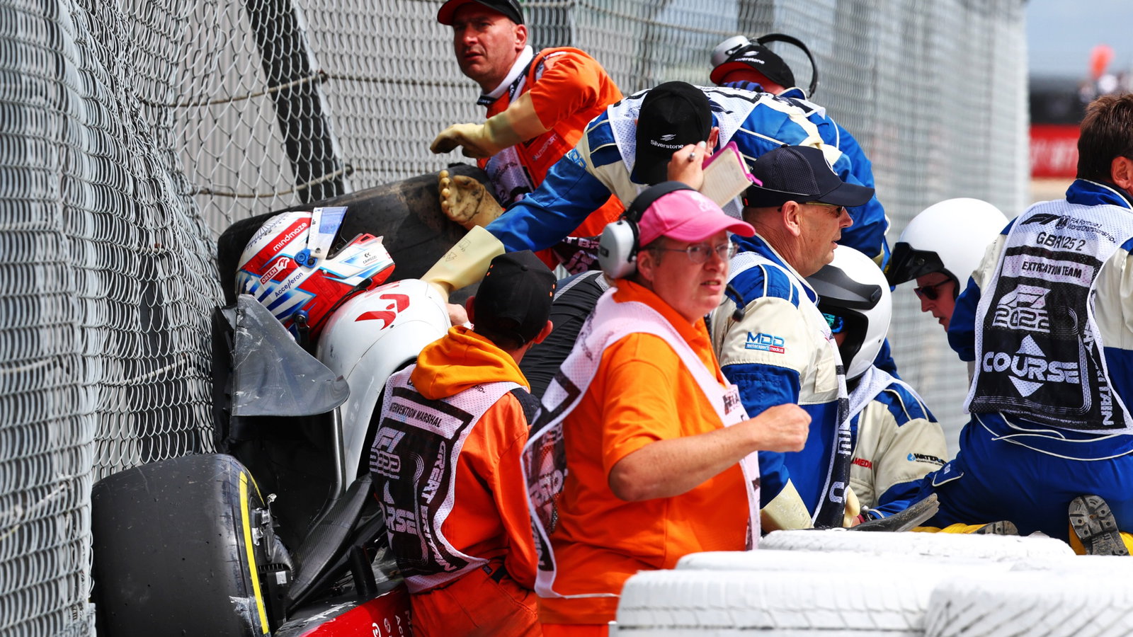 Guanyu Zhou (CHN) is extracted from his Alfa Romeo F1 Team C42 after he crashed at the start of the race. Formula 1 World