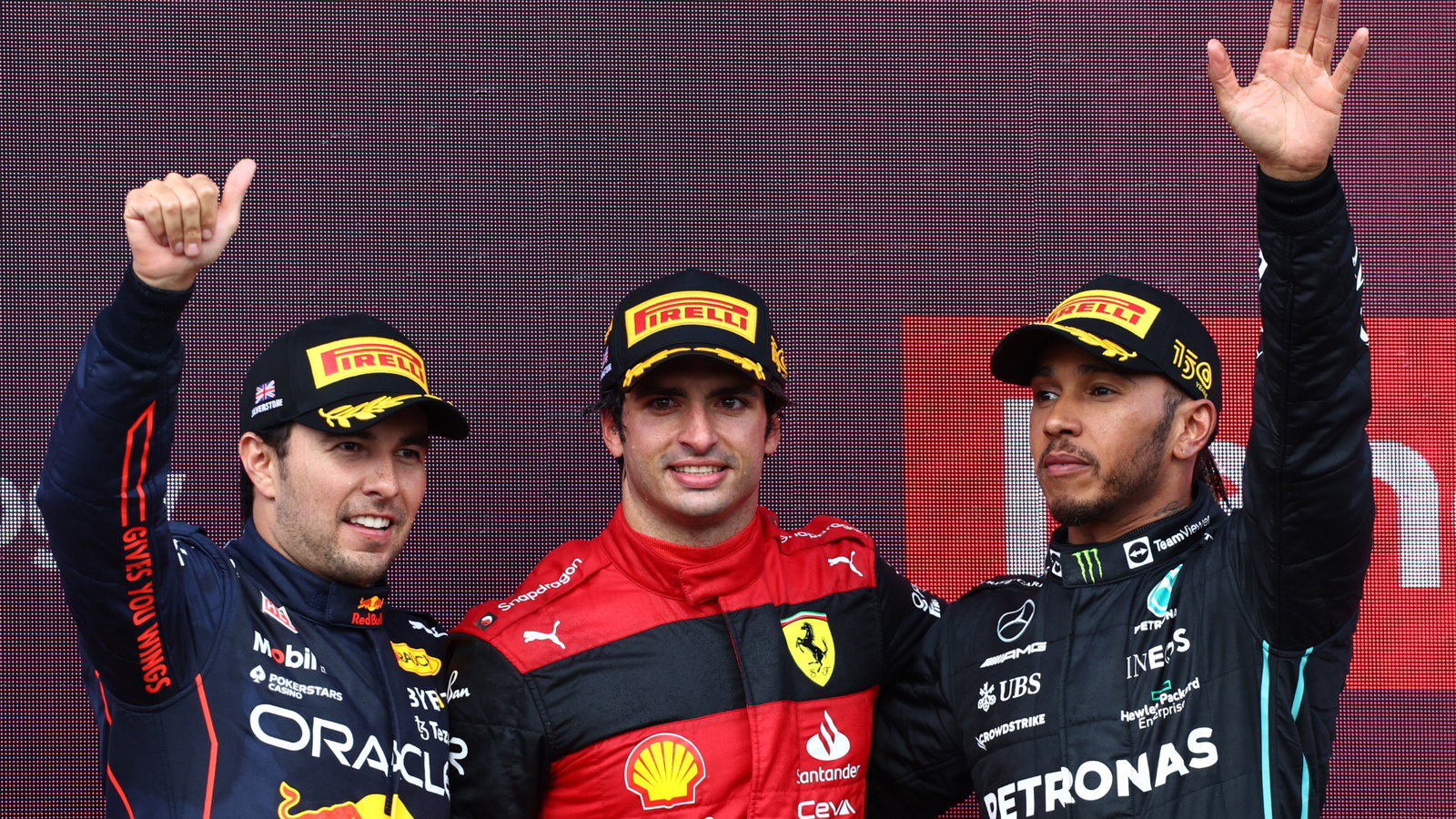1st place Carlos Sainz Jr (ESP) Ferrari F1-75, with 2nd place Sergio Perez (MEX) Red Bull Racing RB18 and 3rd place Lewis