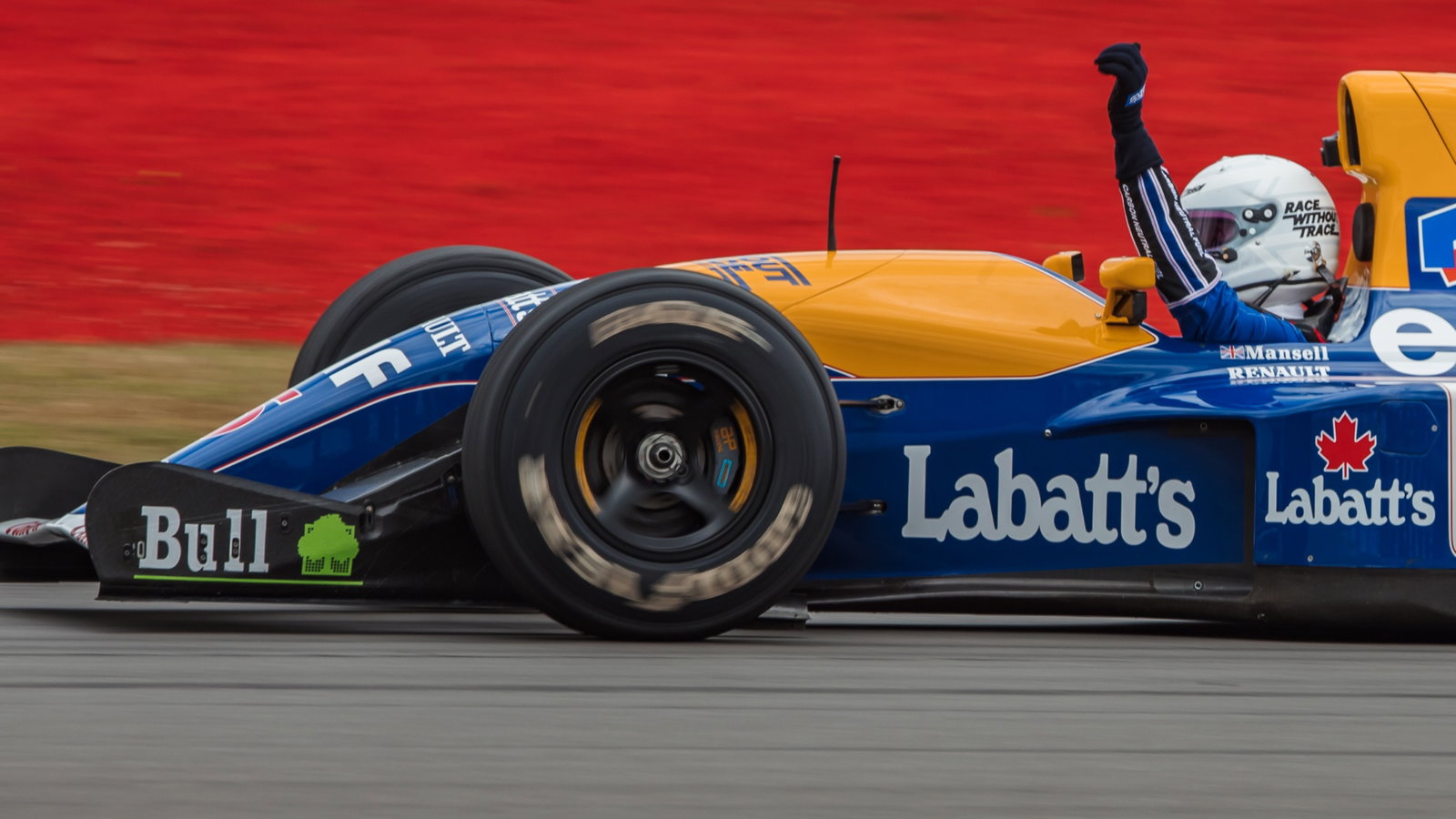 Sebastian Vettel (GER) Aston Martin F1 Team runs his Williams FW14B driven in 1992 by Nigel Mansell (GBR). Formula 1 World