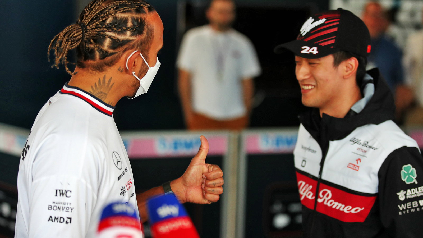 (L to R): Lewis Hamilton (GBR) Mercedes AMG F1 with Guanyu Zhou (CHN) Alfa Romeo F1 Team. Formula 1 World Championship, Rd