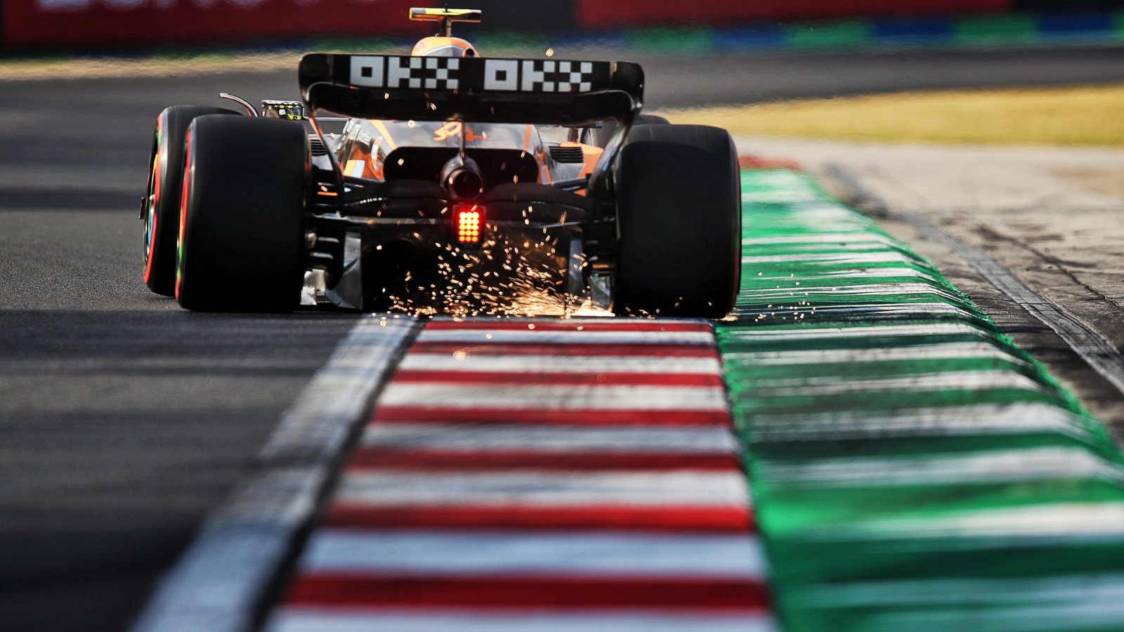 Lando Norris (GBR) McLaren MCL36 sends sparks flying. Formula 1 World Championship, Rd 13, Hungarian Grand Prix, Budapest,