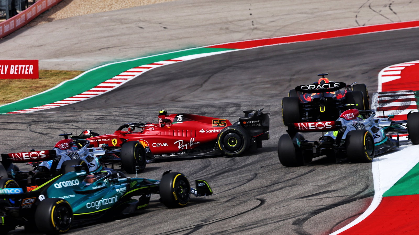 Carlos Sainz Jr (ESP) Ferrari F1-75 is hit by George Russell (GBR) Mercedes AMG F1 W13 at the start of the race. Formula 1