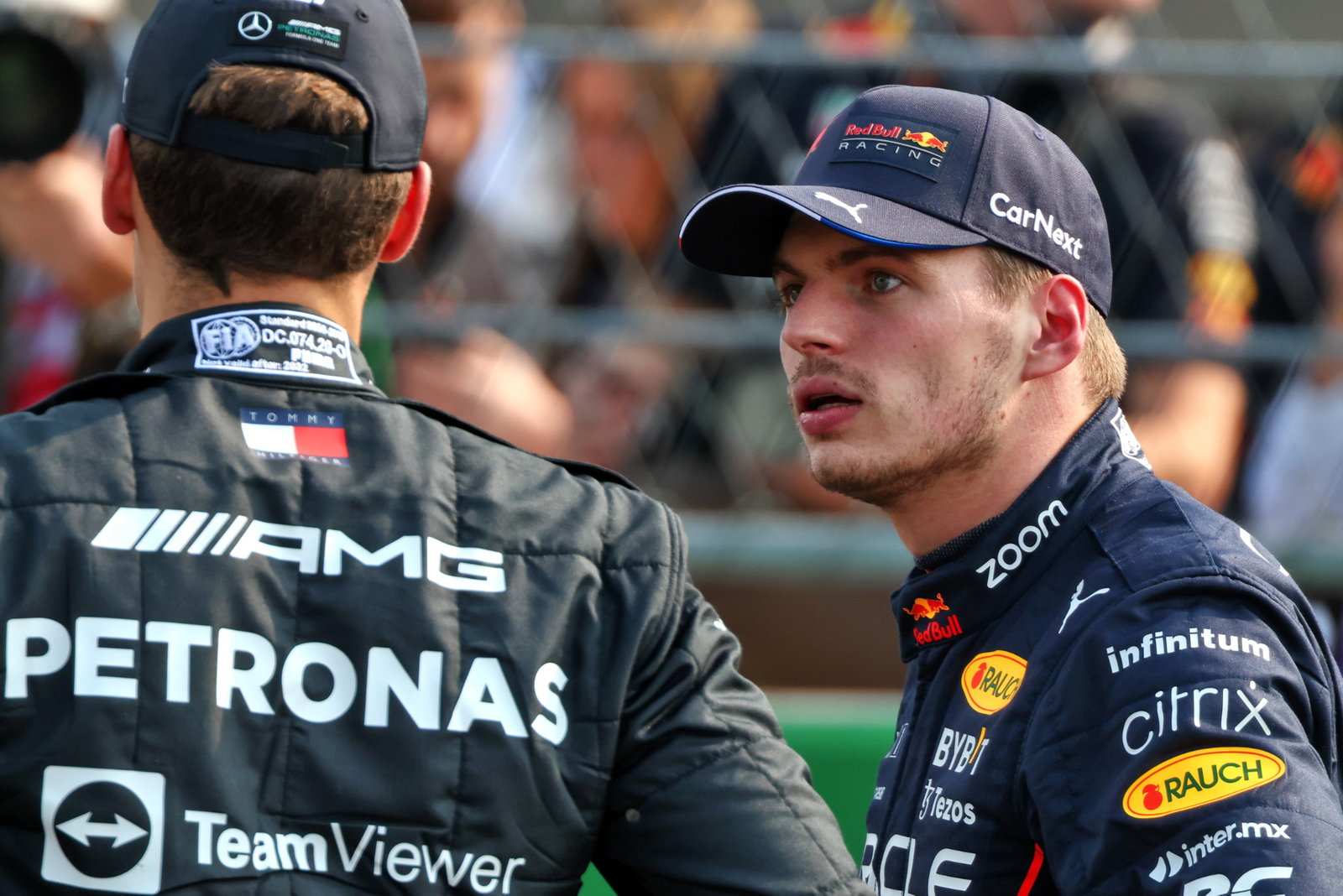 (L to R): George Russell (GBR) Mercedes AMG F1 with pole sitter Max Verstappen (NLD) Red Bull Racing in qualifying parc