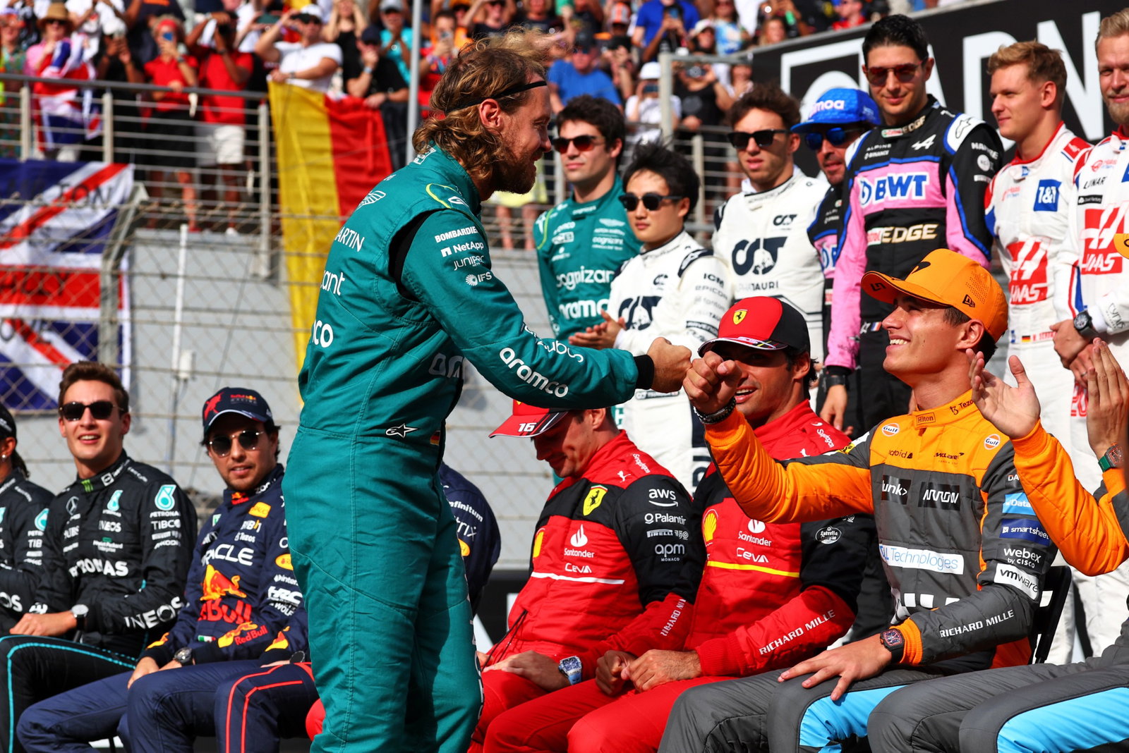 Sebastian Vettel (GER) Aston Martin F1 Team with Lando Norris (GBR) McLaren at the end of year drivers' photograph.