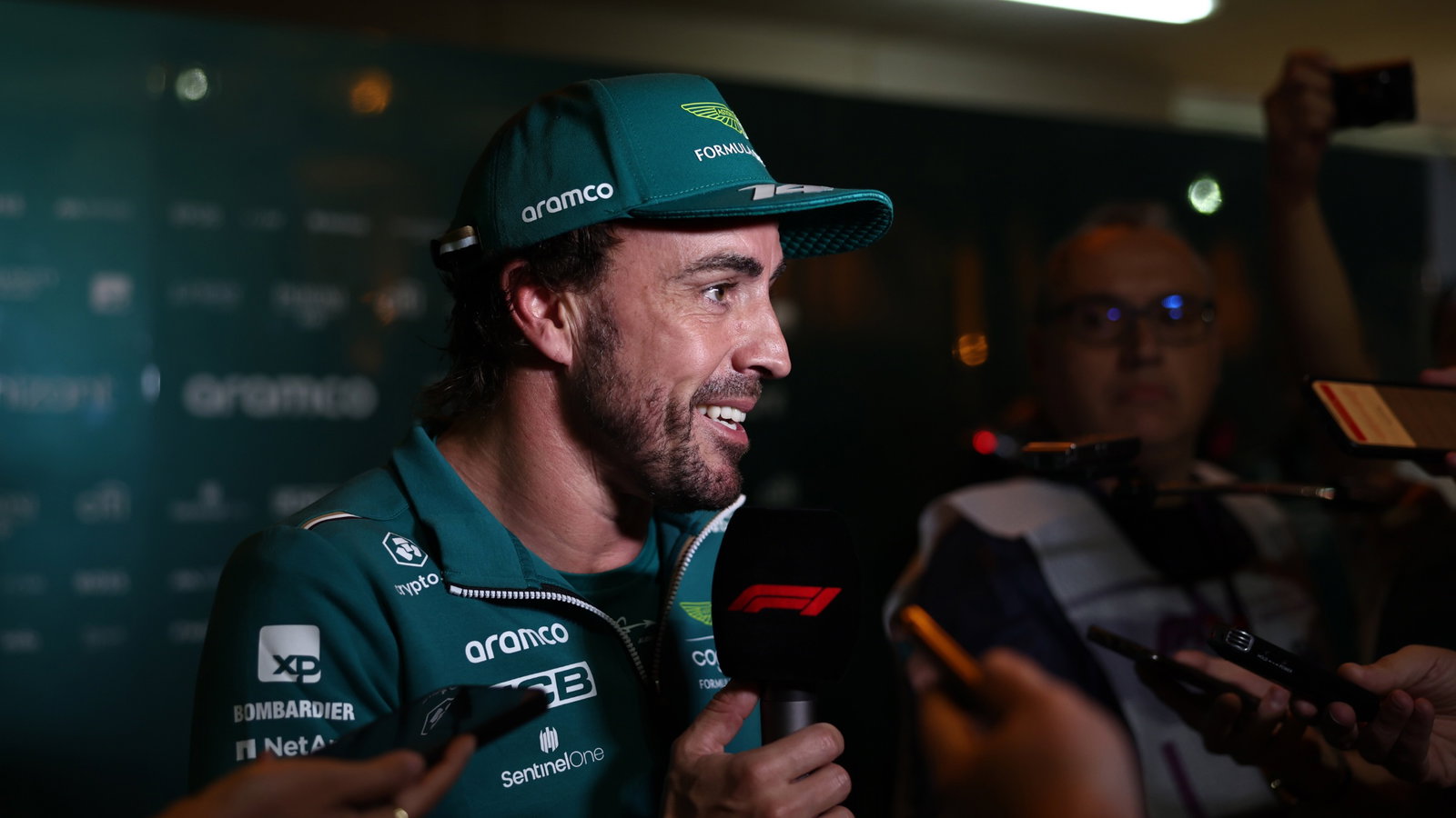 Fernando Alonso (ESP) Aston Martin F1 Team with the media. Formula 1 World Championship, Rd 1, Bahrain Grand Prix, Sakhir,