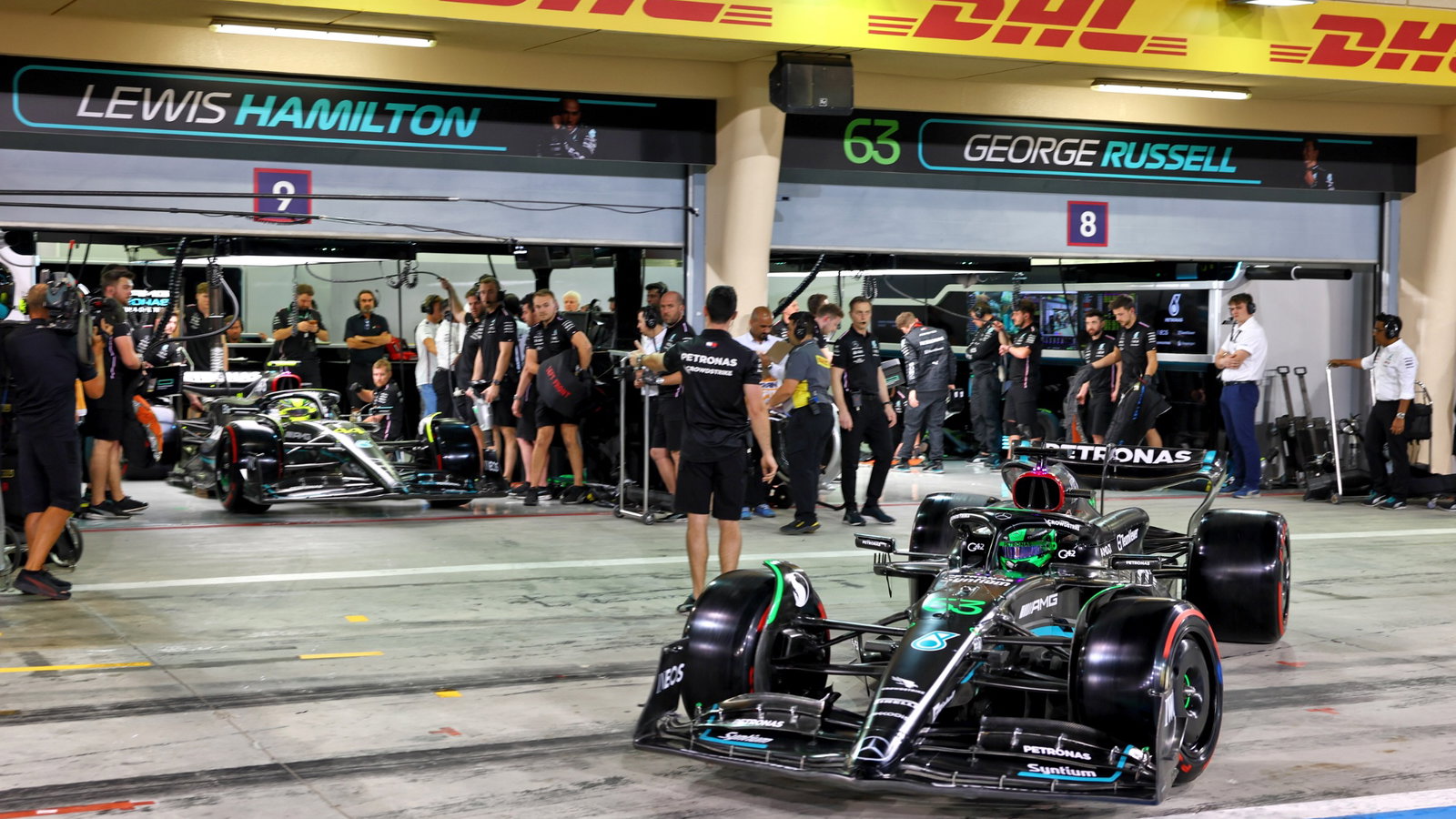 George Russell (GBR) Mercedes AMG F1 W14 leaves the pits with team mate Lewis Hamilton (GBR) Mercedes AMG F1 W14. Formula