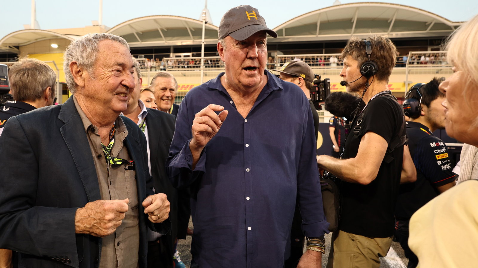 Jeremy Clarkson (GBR) TV Presenter with Nick Mason (GBR) Pink Floyd Drummer on the grid. Formula 1 World Championship, Rd