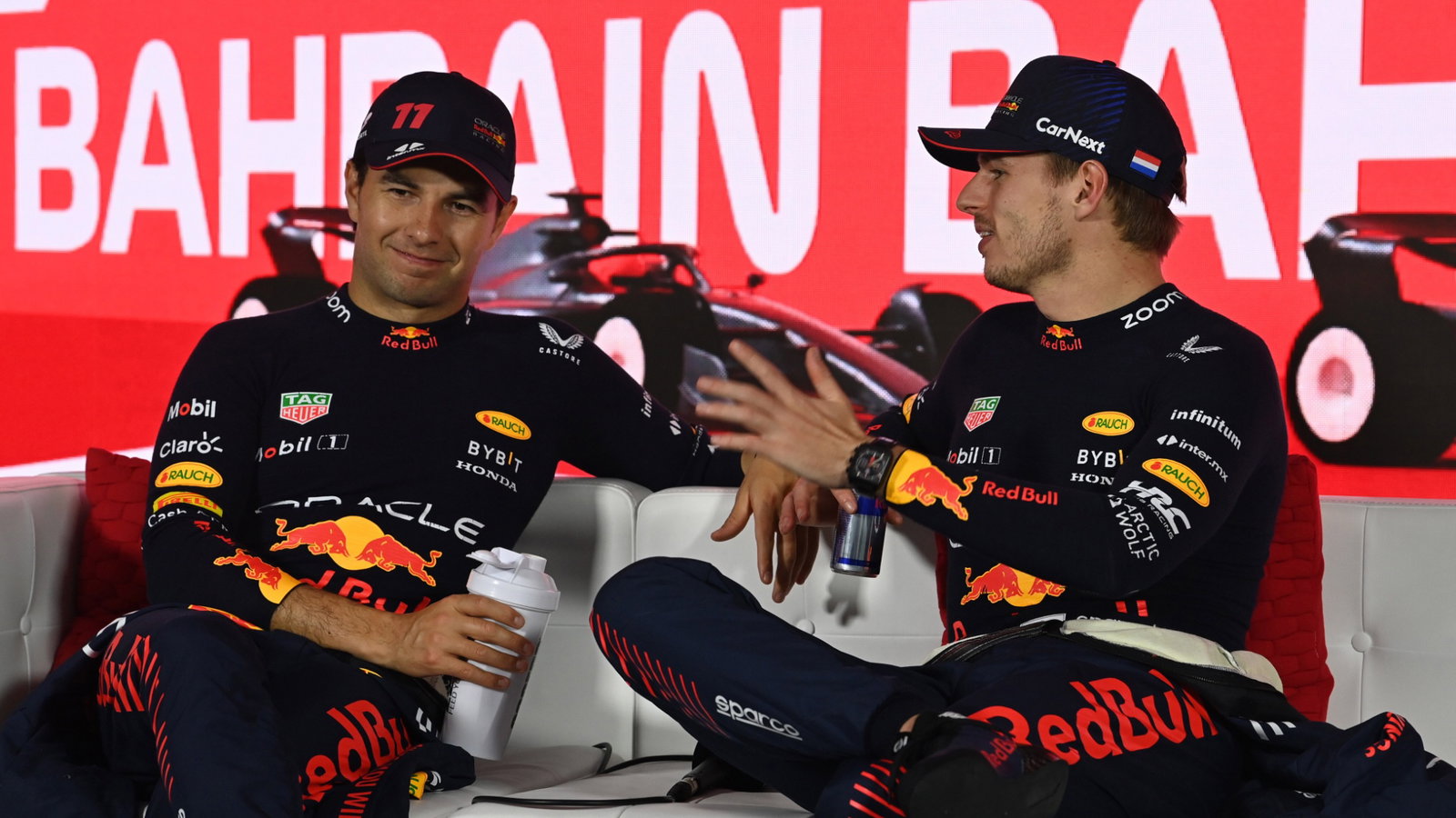 (L to R): Sergio Perez (MEX) Red Bull Racing and team mate Max Verstappen (NLD) Red Bull Racing in the post race FIA Press