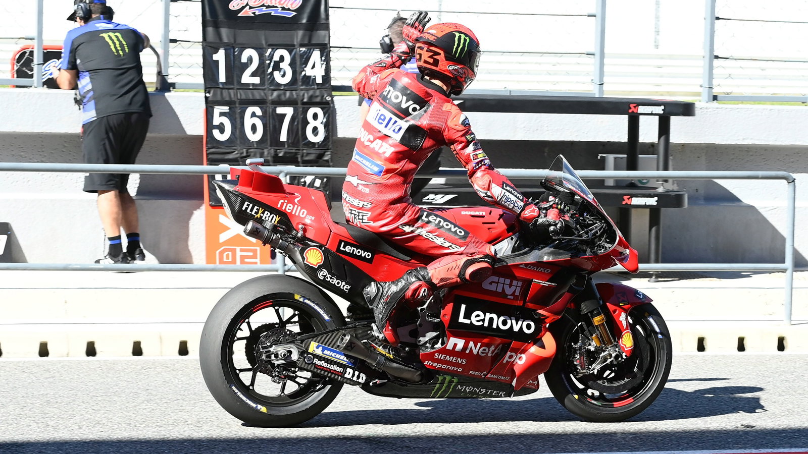 Francesco Bagnaia waves at the crowd, Portuguese MotoGP test, 11 March