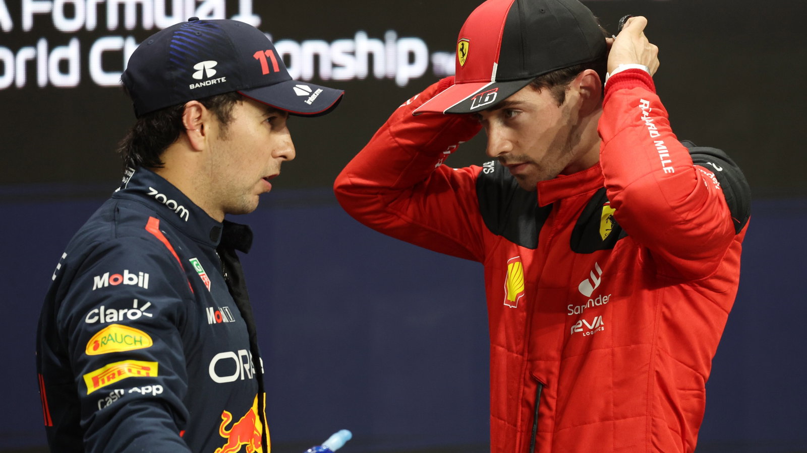 (L to R): Sergio Perez (MEX) Red Bull Racing with Charles Leclerc (MON) Ferrari in qualifying parc ferme. Formula 1 World