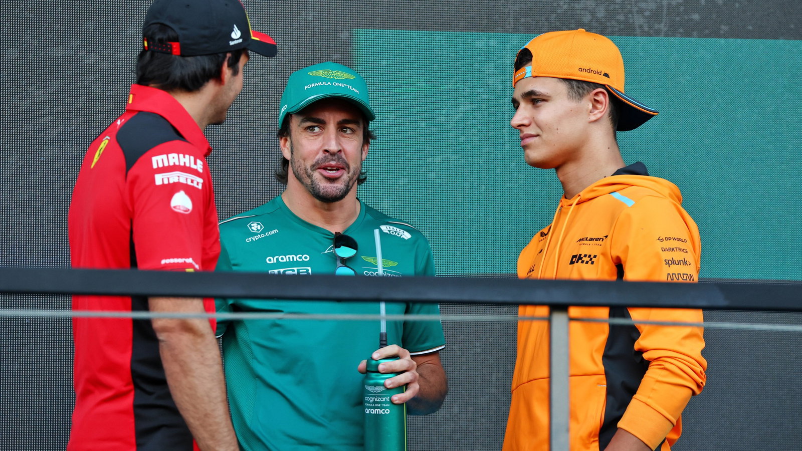 (L to R): Carlos Sainz Jr (ESP) Ferrari with Fernando Alonso (ESP) Aston Martin F1 Team and Lando Norris (GBR) McLaren on