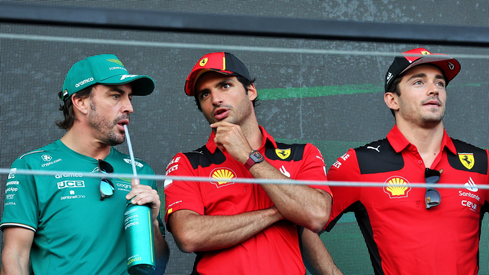 (L to R): Fernando Alonso (ESP) Aston Martin F1 Team with Carlos Sainz Jr (ESP) Ferrari and Charles Leclerc (MON) Ferrari on