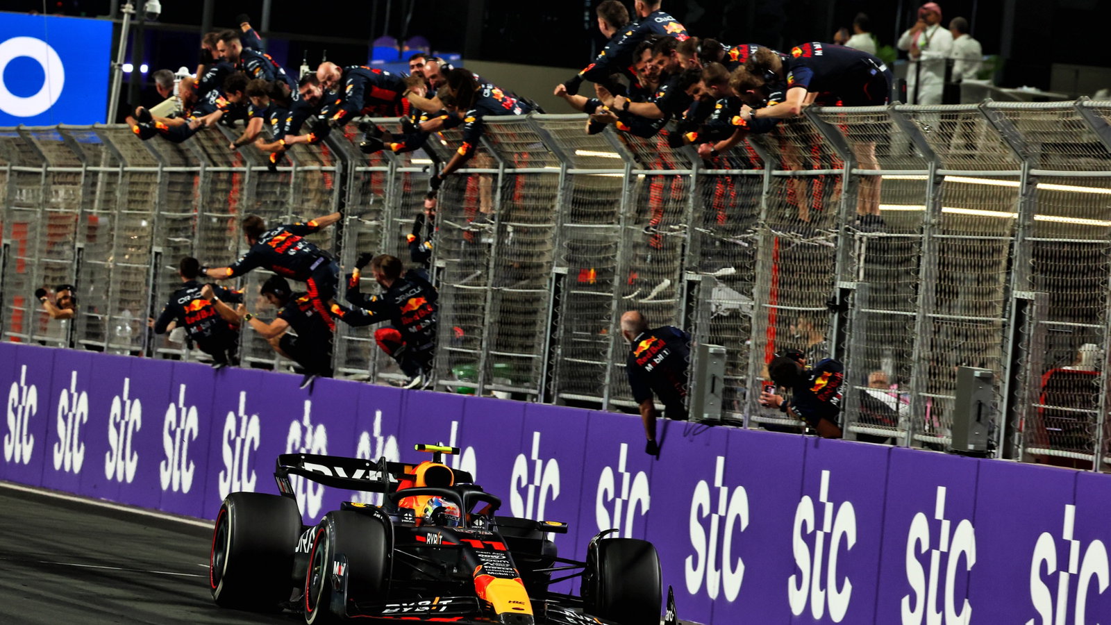 Race winner Sergio Perez (MEX) Red Bull Racing RB19 celebrates as he passes the team at the end of the race. Formula 1