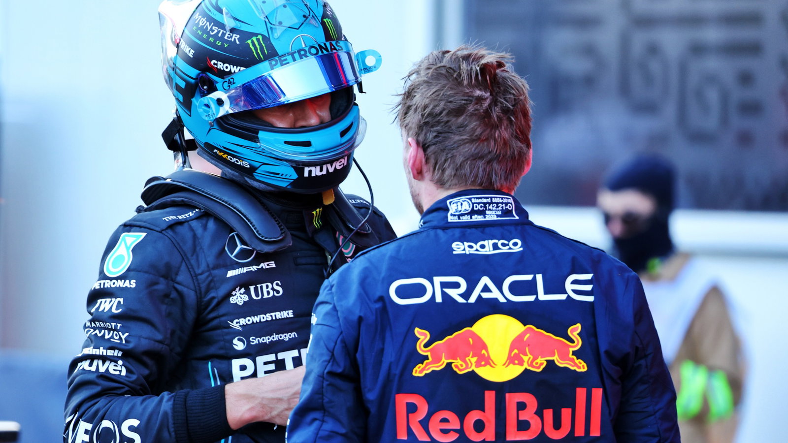 (L to R): George Russell (GBR) Mercedes AMG F1 and Max Verstappen (NLD) Red Bull Racing discuss the Sprint race in parc