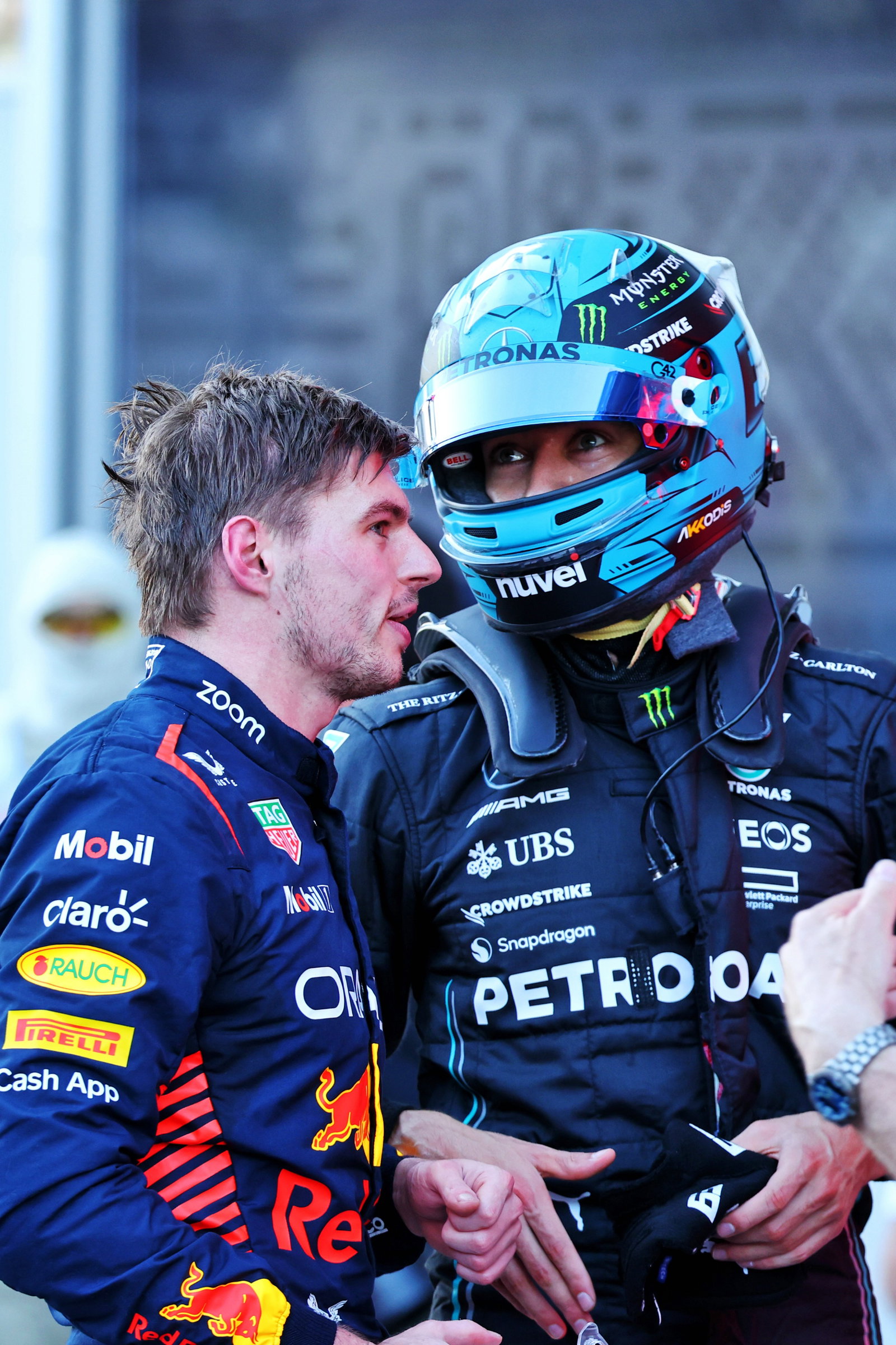 (L to R): Max Verstappen (NLD) Red Bull Racing and George Russell (GBR) Mercedes AMG F1 discuss the Sprint race in parc