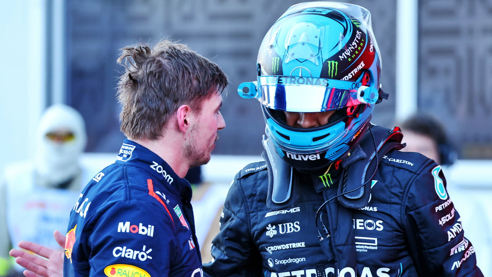 (L to R): Max Verstappen (NLD) Red Bull Racing and George Russell (GBR) Mercedes AMG F1 discuss the Sprint race in parc