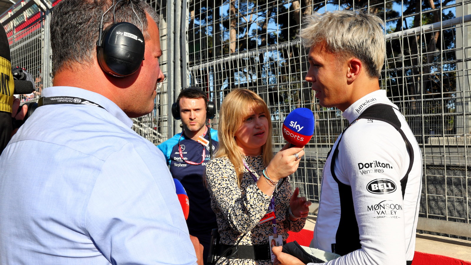 Alexander Albon (THA) Williams Racing on the grid with Ted Kravitz 