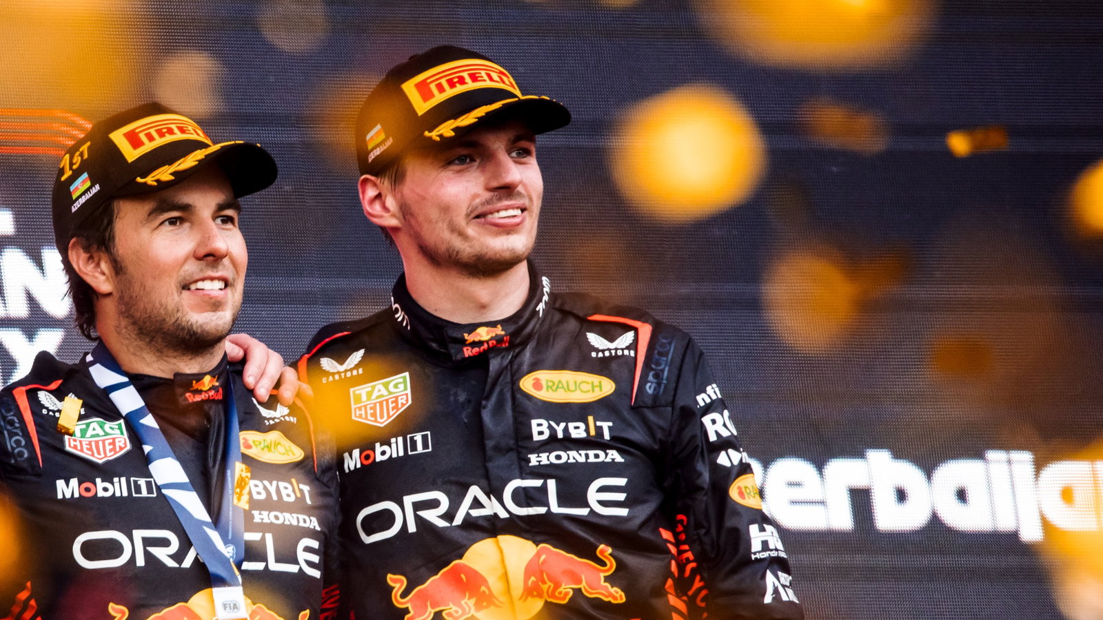 (L to R): Race winner Sergio Perez (MEX) Red Bull Racing with second placed team mate Max Verstappen (NLD) Red Bull Racing
