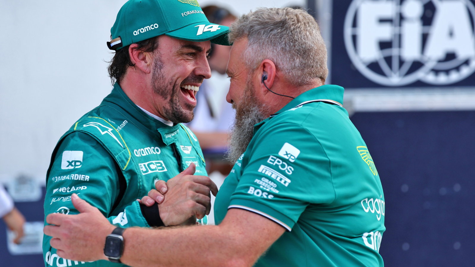 Fernando Alonso (ESP) Aston Martin F1 Team celebrates his second position in qualifying parc ferme with the team. Formula
