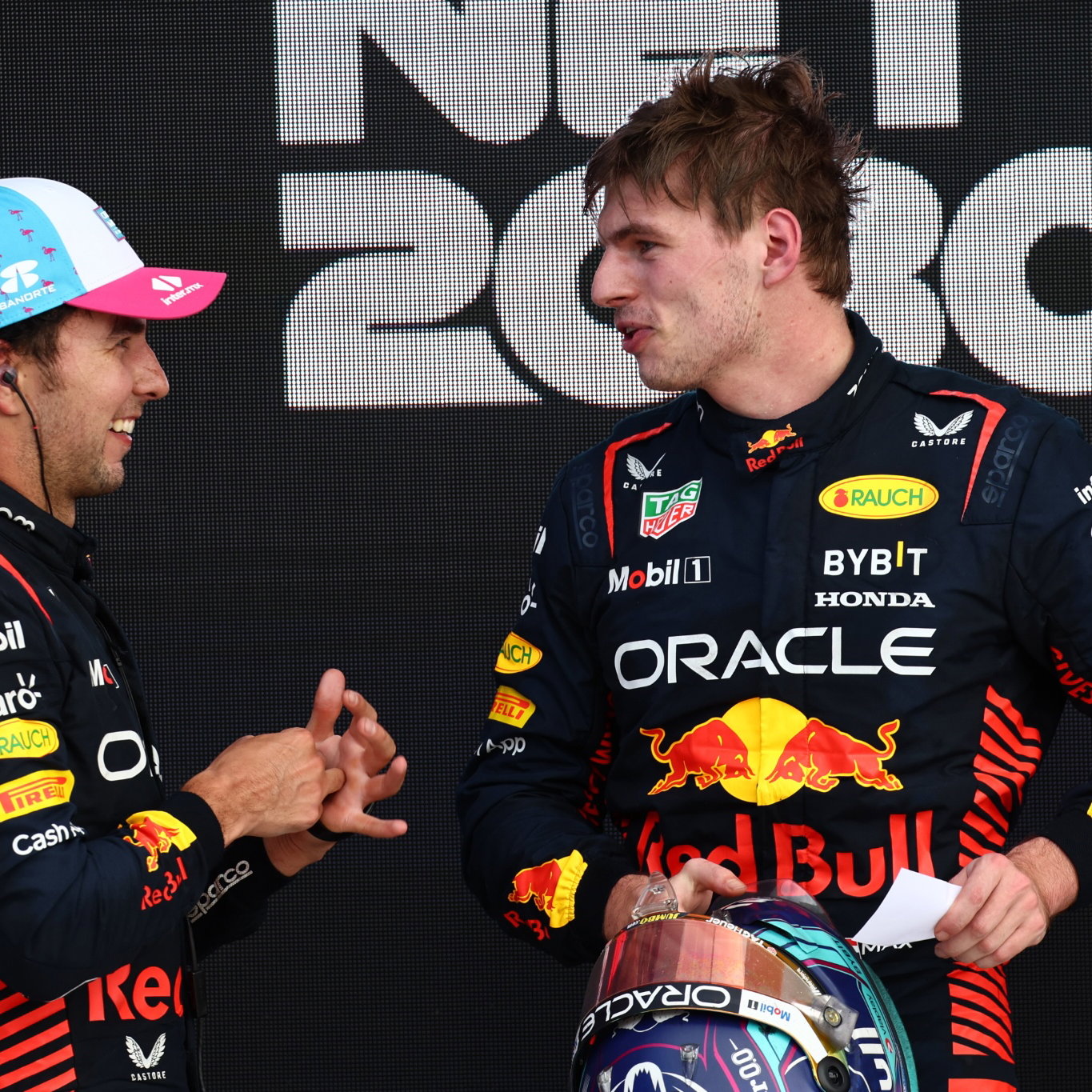 2nd place Sergio Perez (MEX) Red Bull Racing with 1st place Max Verstappen (NLD) Red Bull Racing. Formula 1 World