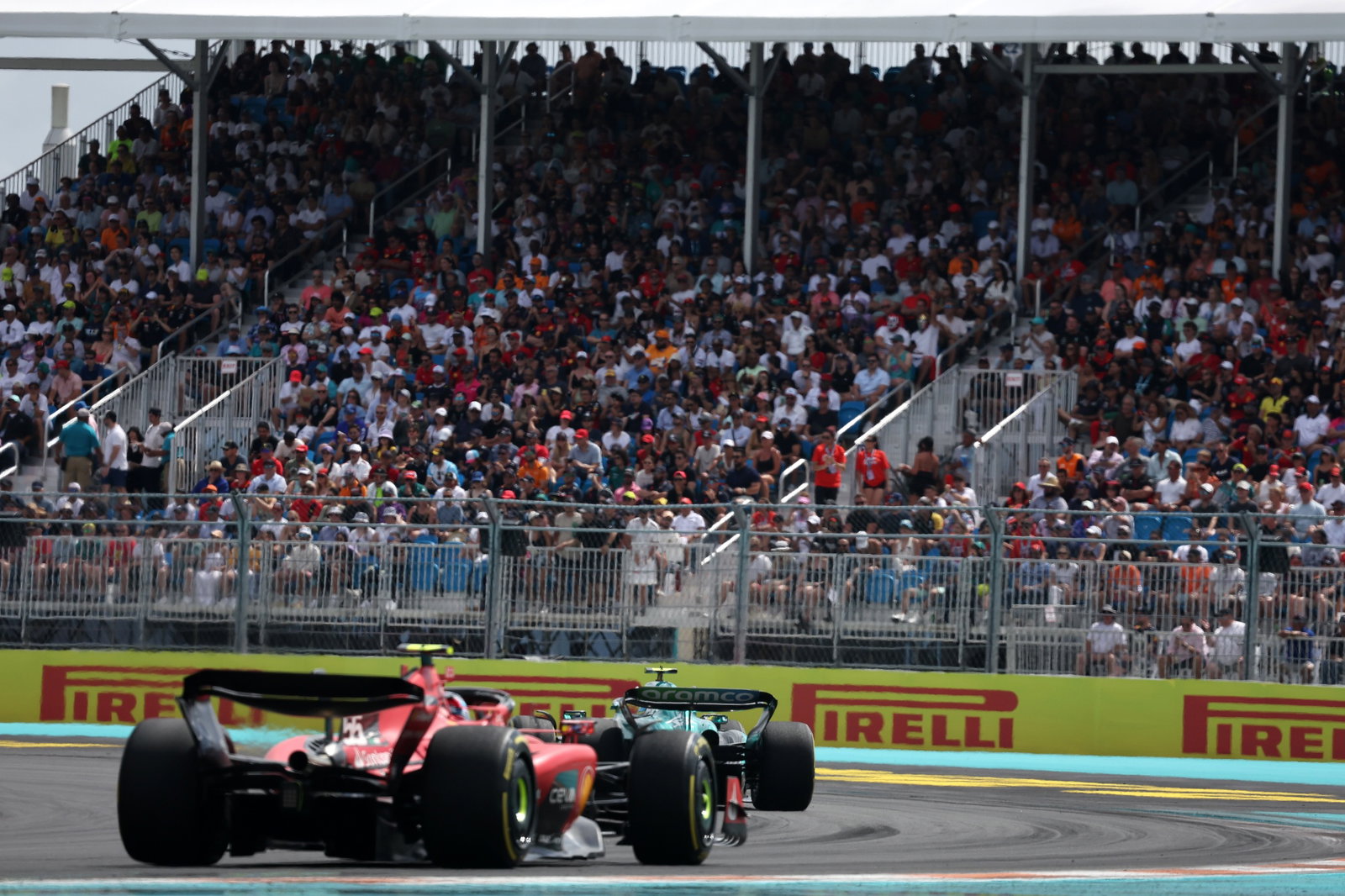 Fernando Alonso (ESP) Aston Martin F1 Team AMR23 leads Carlos Sainz Jr (ESP) Ferrari SF-23. Formula 1 World Championship,
