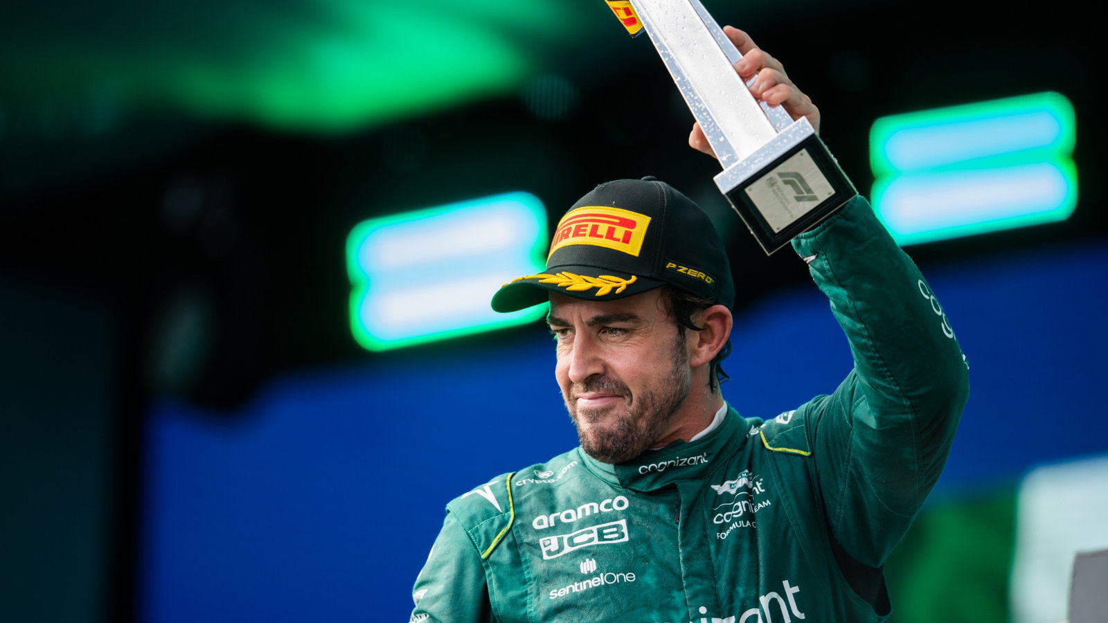 Fernando Alonso (ESP) Aston Martin F1 Team celebrates his third position on the podium. Formula 1 World Championship, Rd