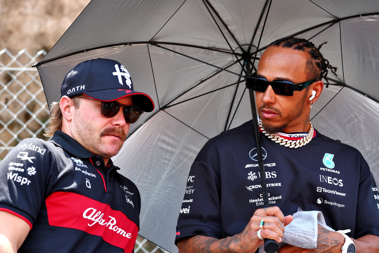 (L to R): Valtteri Bottas (FIN) Alfa Romeo F1 Team and Lewis Hamilton (GBR) Mercedes AMG F1 on the drivers' parade.