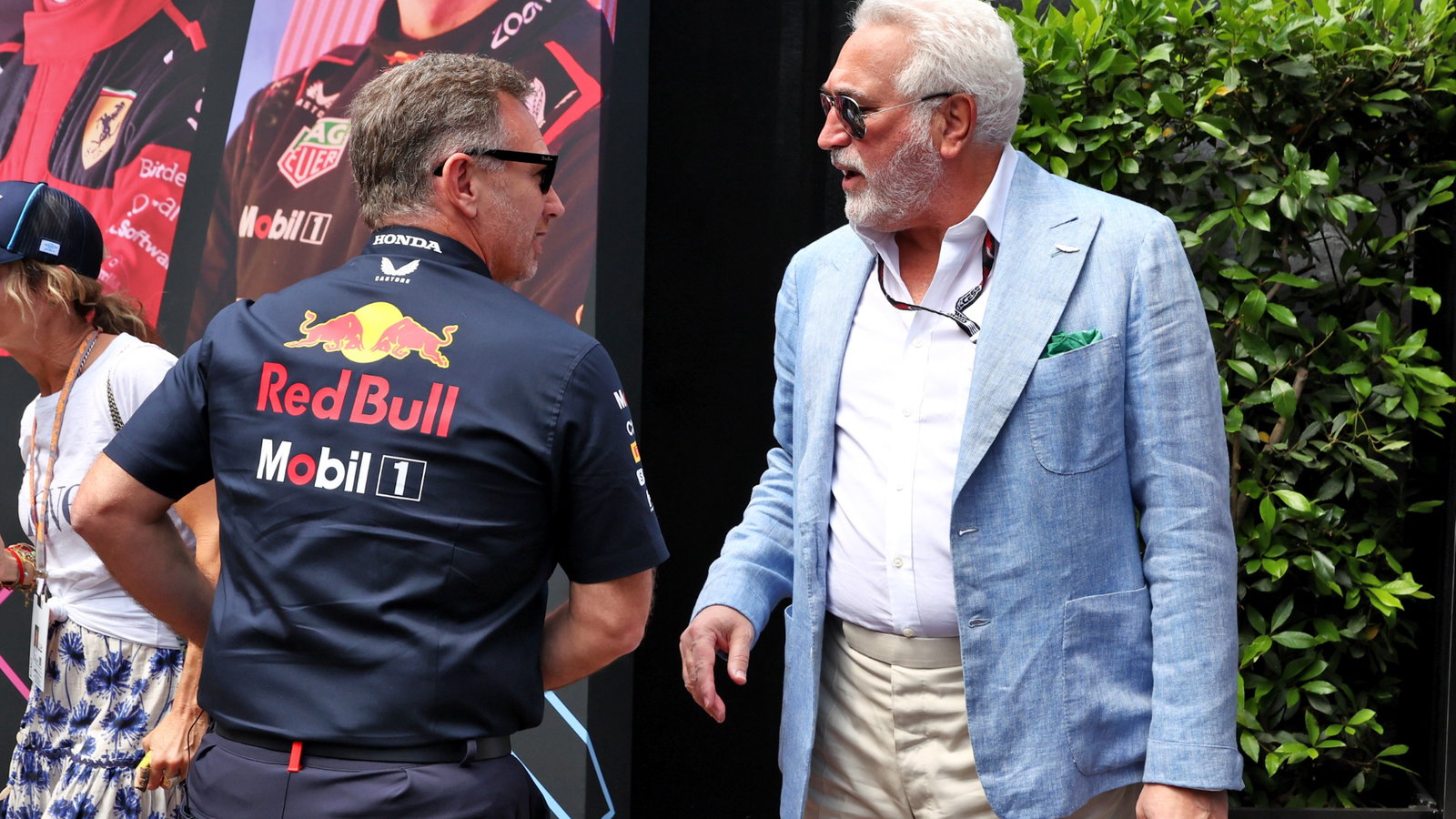 (L to R): Christian Horner (GBR) Red Bull Racing Team Principal with Lawrence Stroll (CDN) Aston Martin F1 Team Investor.
