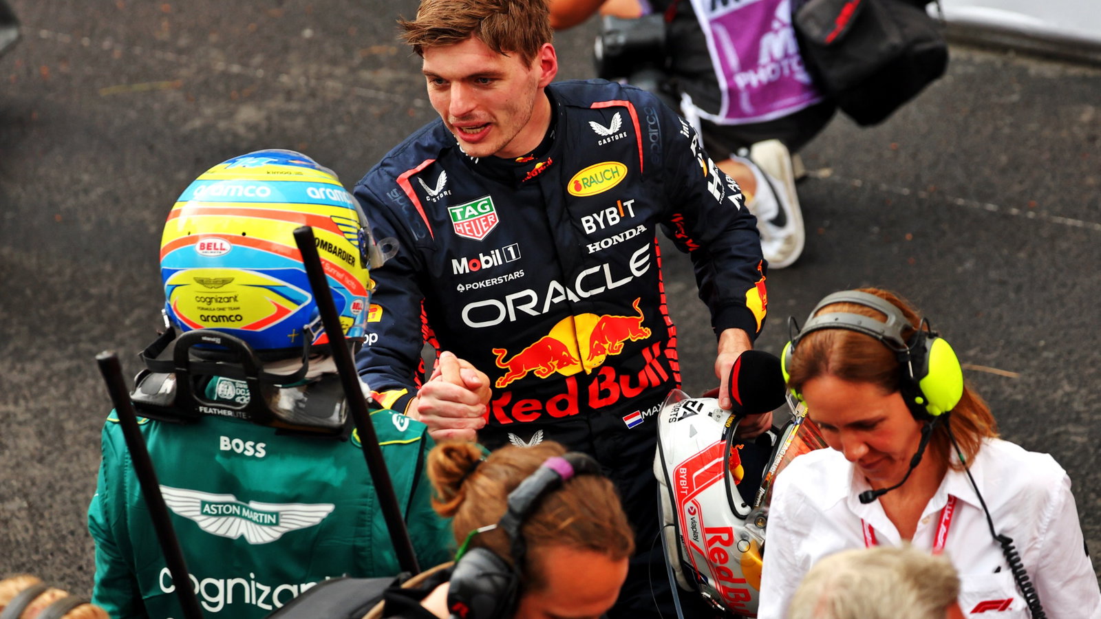 Race winner Max Verstappen (NLD) Red Bull Racing with second placed Fernando Alonso (ESP) Aston Martin F1 Team in parc