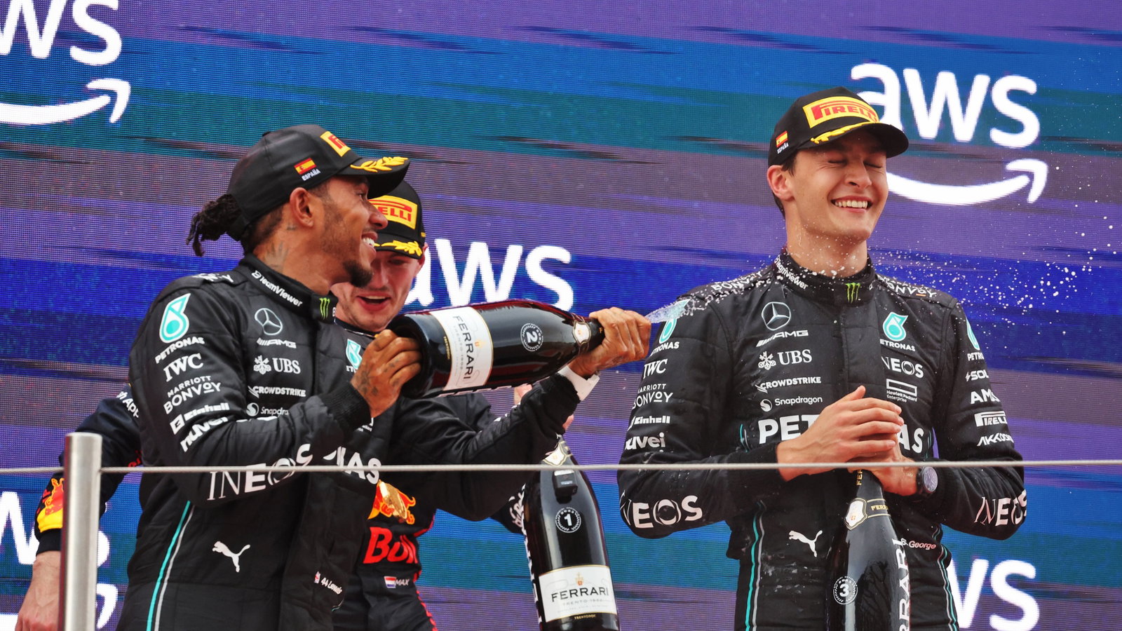 (L to R): Lewis Hamilton (GBR) Mercedes AMG F1 celebrates his second position on the podium with third placed team mate