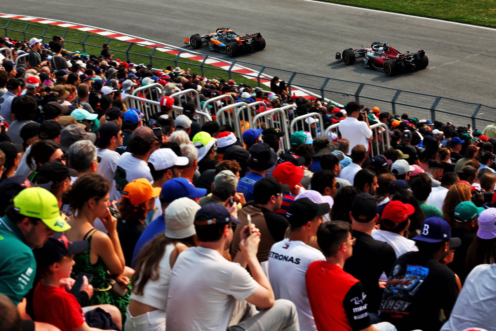 Oscar Piastri (AUS) McLaren MCL60 and Valtteri Bottas (FIN) Alfa Romeo F1 Team C43. Formula 1 World Championship, Rd 9,