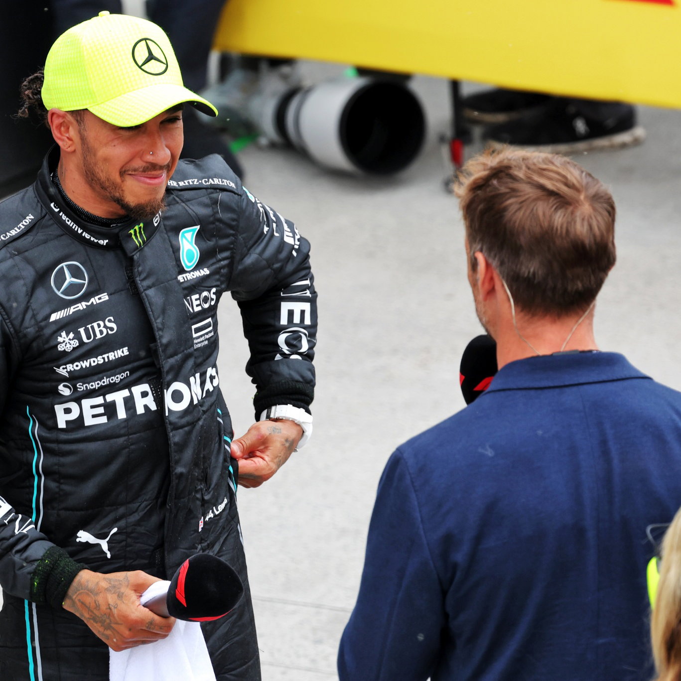 Lewis Hamilton (GBR) Mercedes AMG F1 with Jenson Button (GBR) Sky Sports F1 Presenter / Williams Racing Senior Advisor in