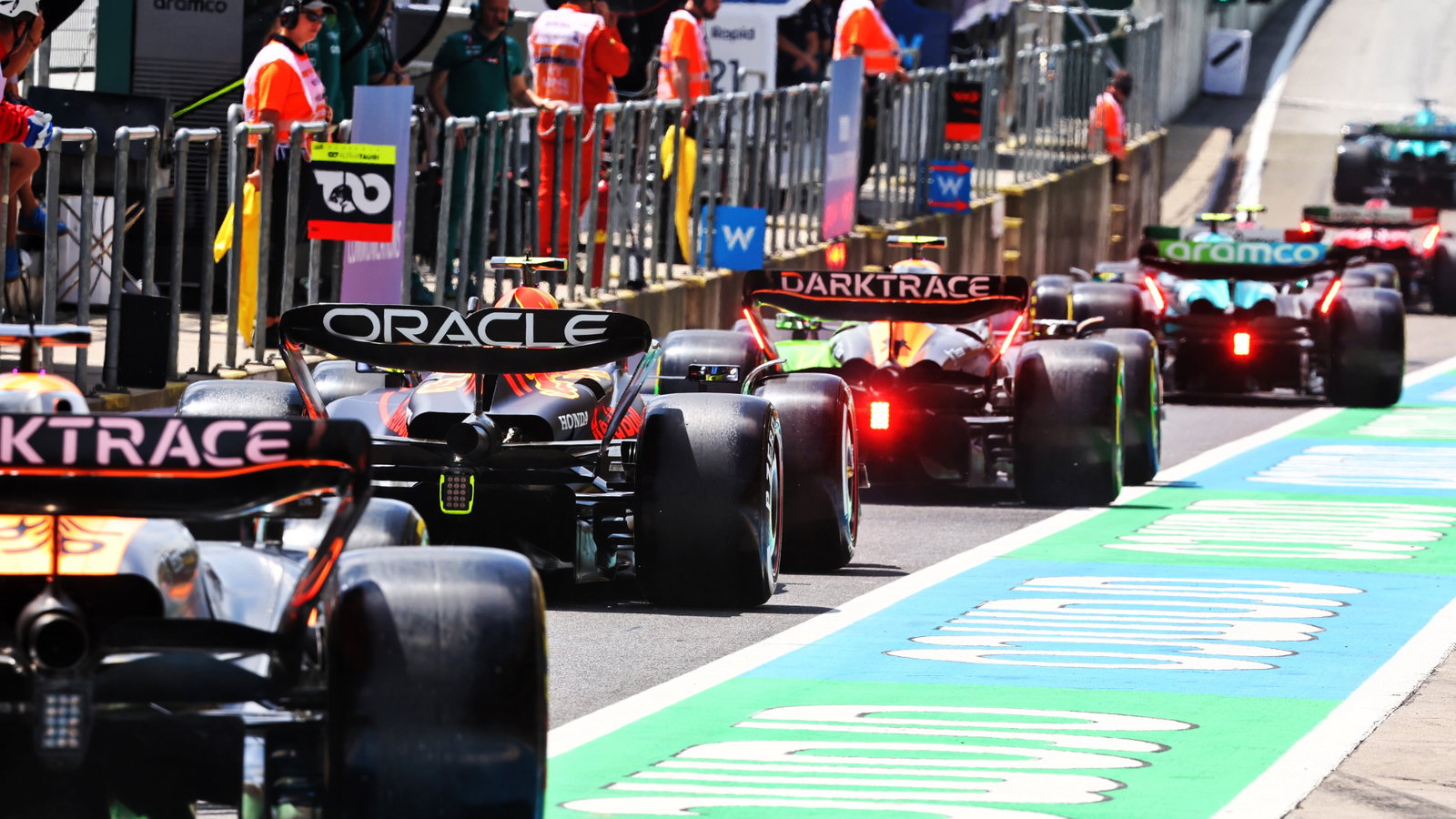 Sergio Perez (MEX) Red Bull Racing RB19 leaves the pits. Formula 1 World Championship, Rd 10, Austrian Grand Prix,