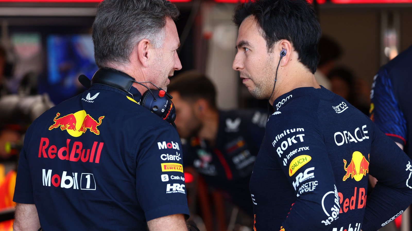 (L to R): Christian Horner (GBR) Red Bull Racing Team Principal with Sergio Perez (MEX) Red Bull Racing. Formula 1 World