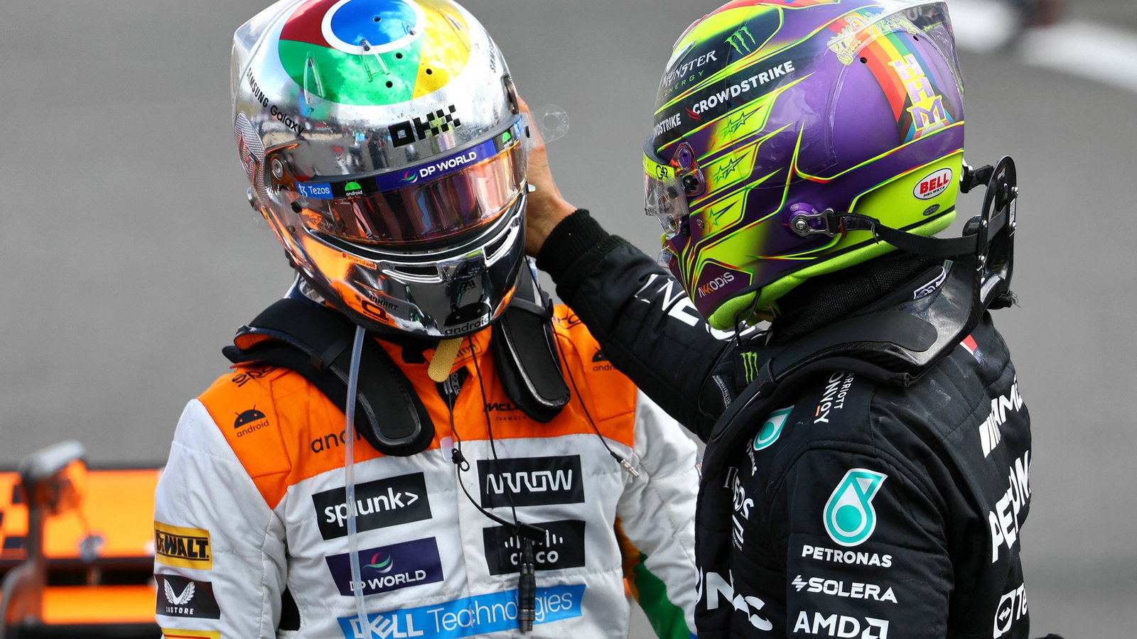 (L to R): Lando Norris (GBR) McLaren celebrates his second position with third placed Lewis Hamilton (GBR) Mercedes AMG