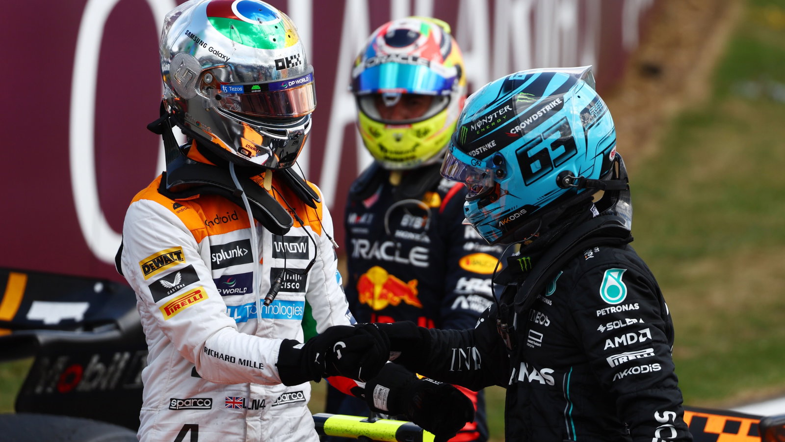 (L to R): Lando Norris (GBR) McLaren celebrates his second position in parc ferme with George Russell (GBR) Mercedes AMG