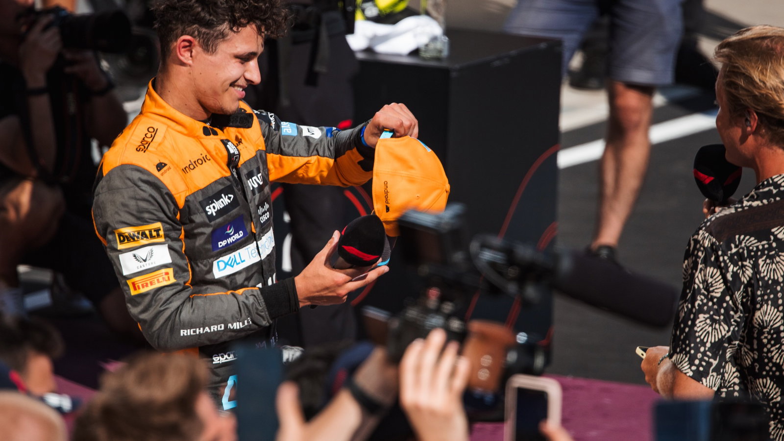 Lando Norris (GBR) McLaren with Nico Rosberg (GER) in parc ferme. Formula 1 World Championship, Rd 12, Hungarian Grand