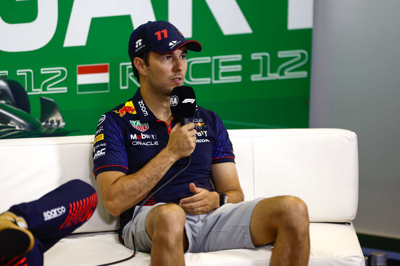Sergio Perez (MEX) Red Bull Racing, dalam konferensi pers FIA pasca balapan. Kejuaraan Dunia Formula 1, Rd 12, Hungaria