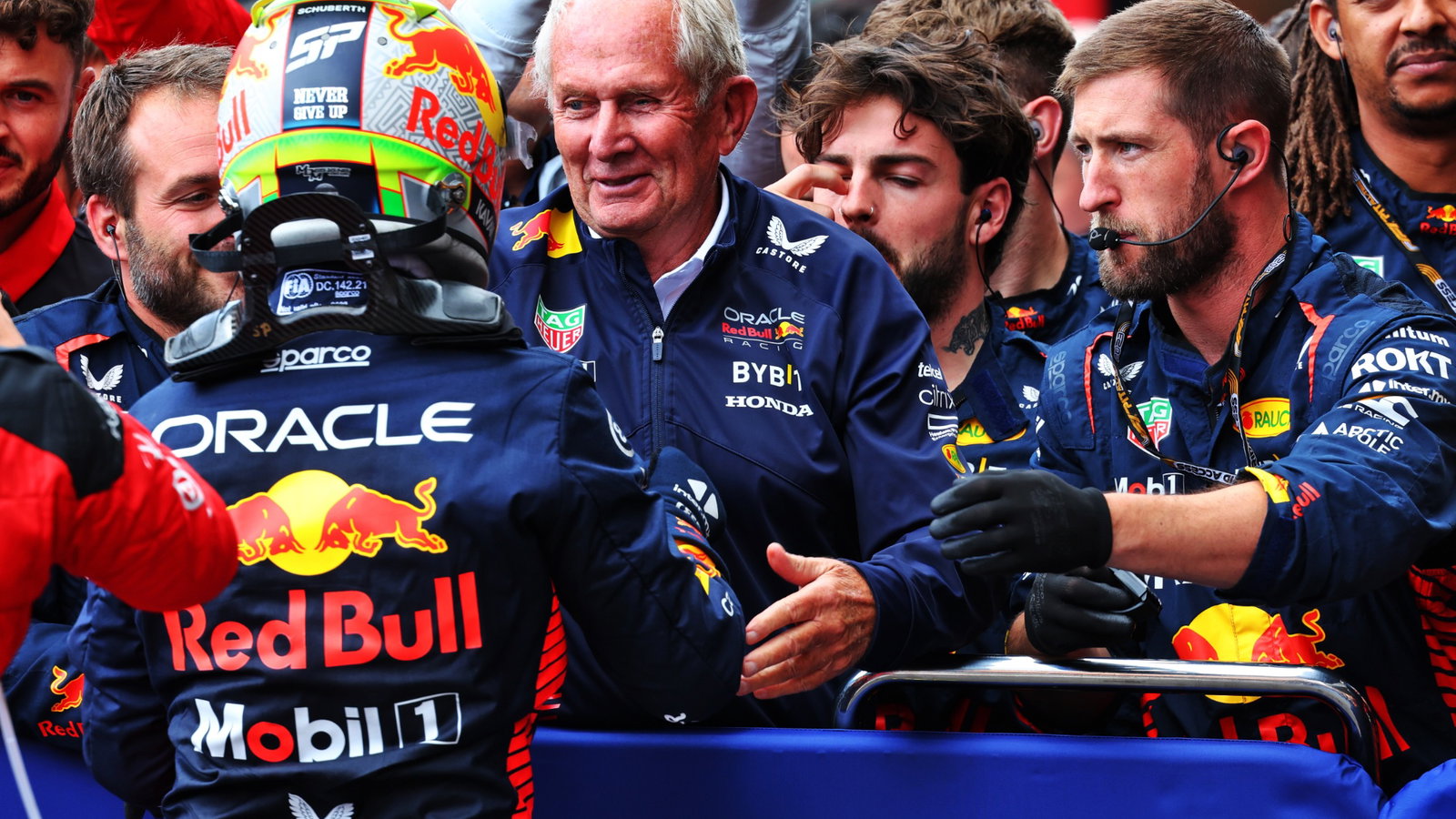 Sergio Perez (MEX) Red Bull Racing celebrates his second position in parc ferme with Dr Helmut Marko (AUT) Red Bull