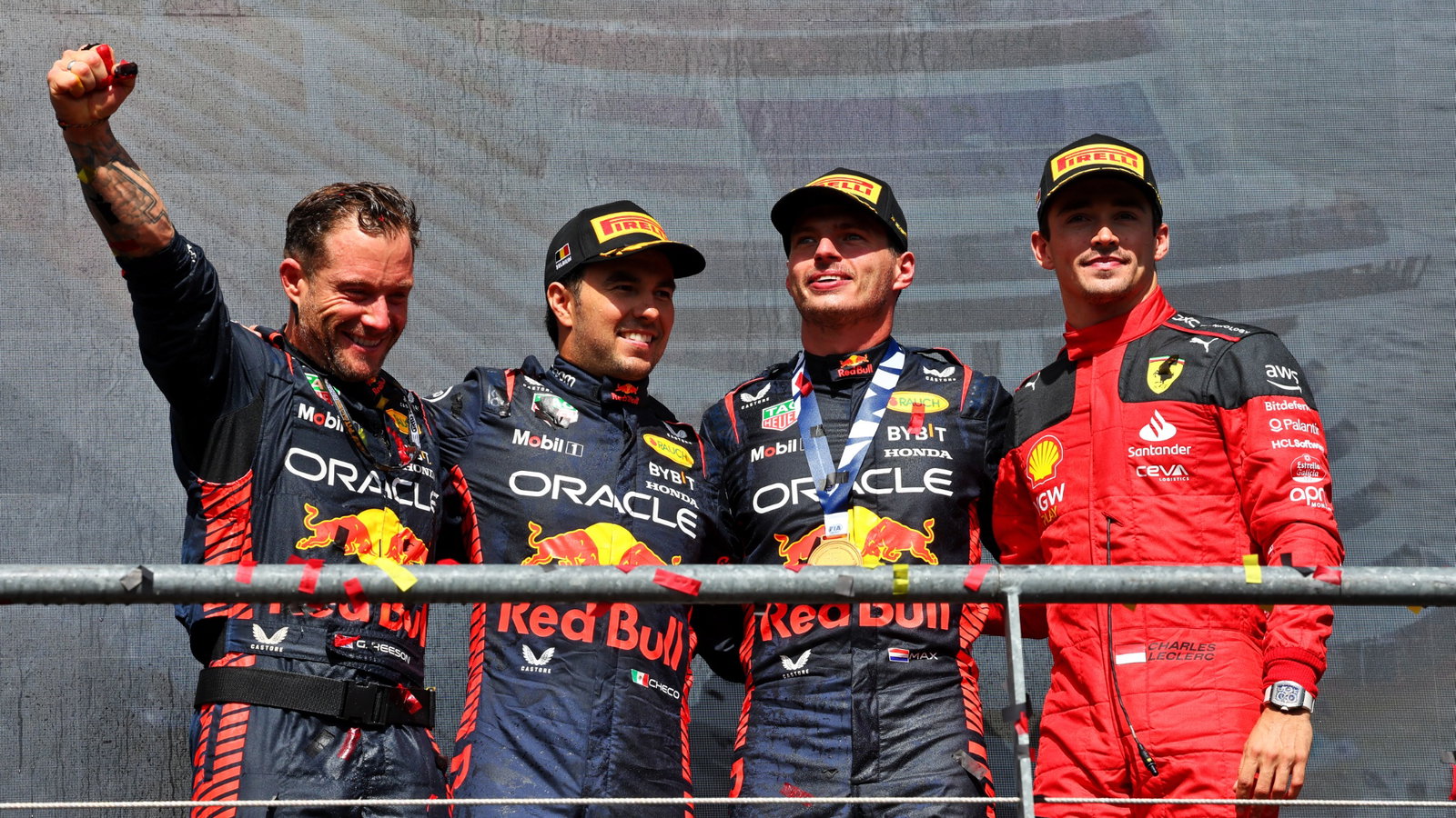The podium (L to R): Greg Reeson (GBR) Red Bull Racing Tyre Technician; Sergio Perez (MEX) Red Bull Racing, second; Max