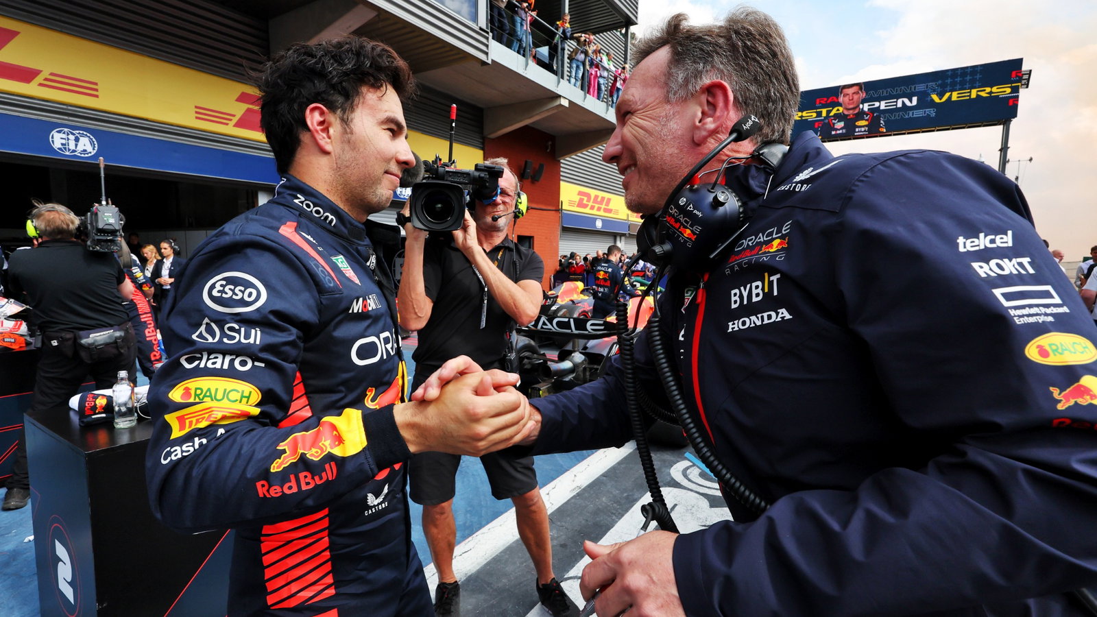 (L to R): Sergio Perez (MEX) Red Bull Racing celebrates his second position with Christian Horner (GBR) Red Bull Racing Team